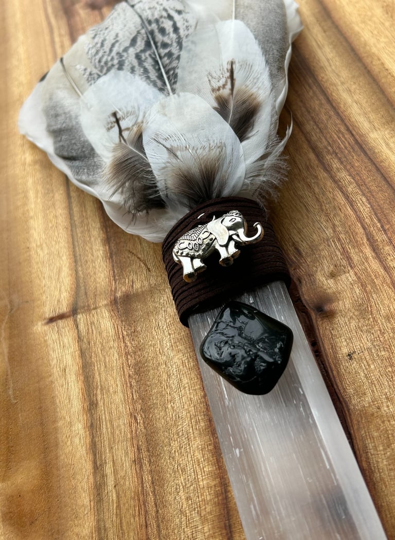 Handcrafted selenite healing wand with feather for energy clearing and smudging