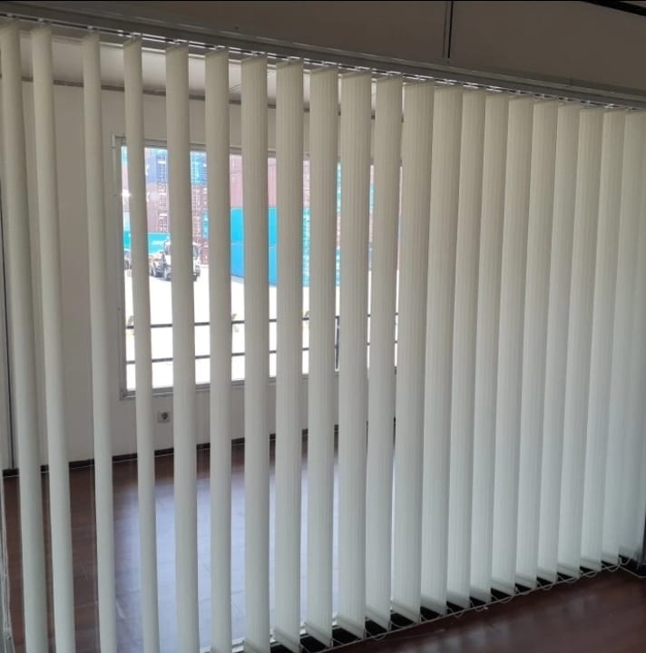 a room with a sliding glass door and a sliding glass door