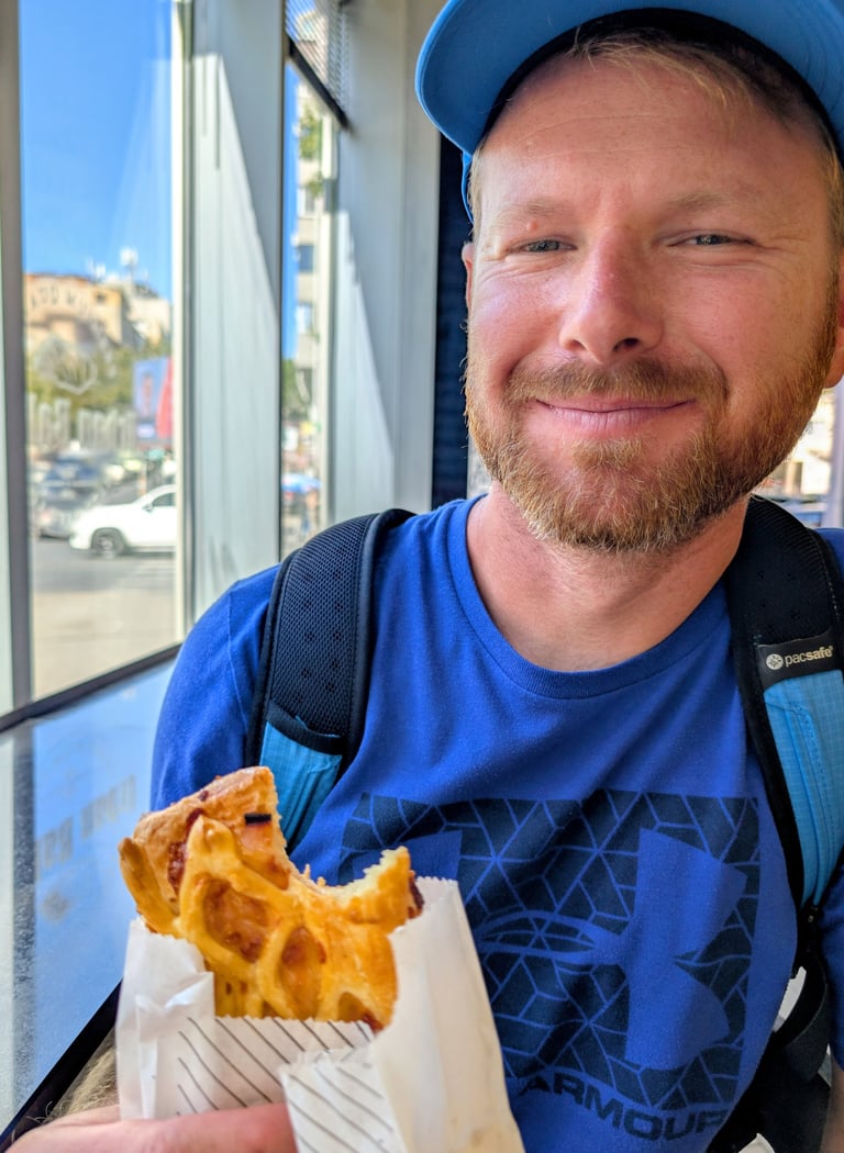 Don eatting a Pastry filled with ham and cheese Belgrade, serbia