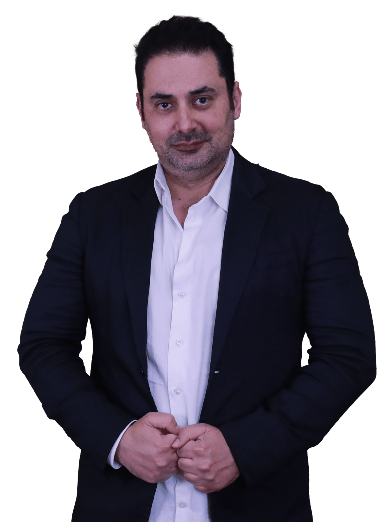 a man in a suit and white shirt nidal nasrallah trainer public speaking