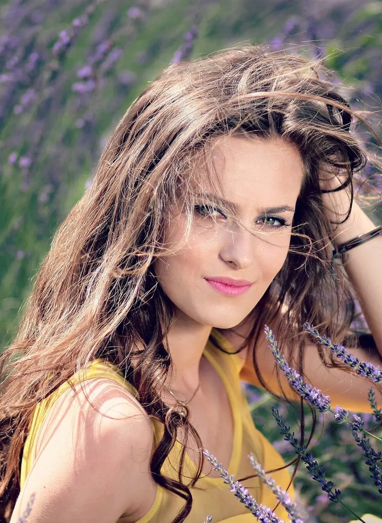 Profile of a woman with long, flowing hair, symbolizing natural beauty and vitality.
