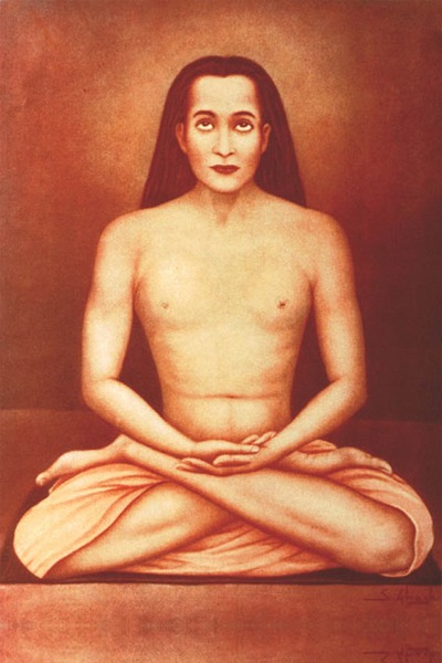 Portrait of Mahavatar Babaji sitting in a meditative yoga pose with long dark hair and a peaceful expression.