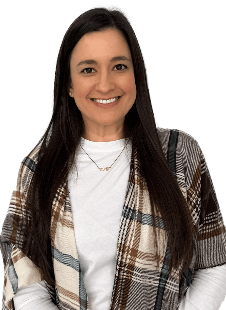 woman with long dark hair wearing a a white shirt and plaid scarf