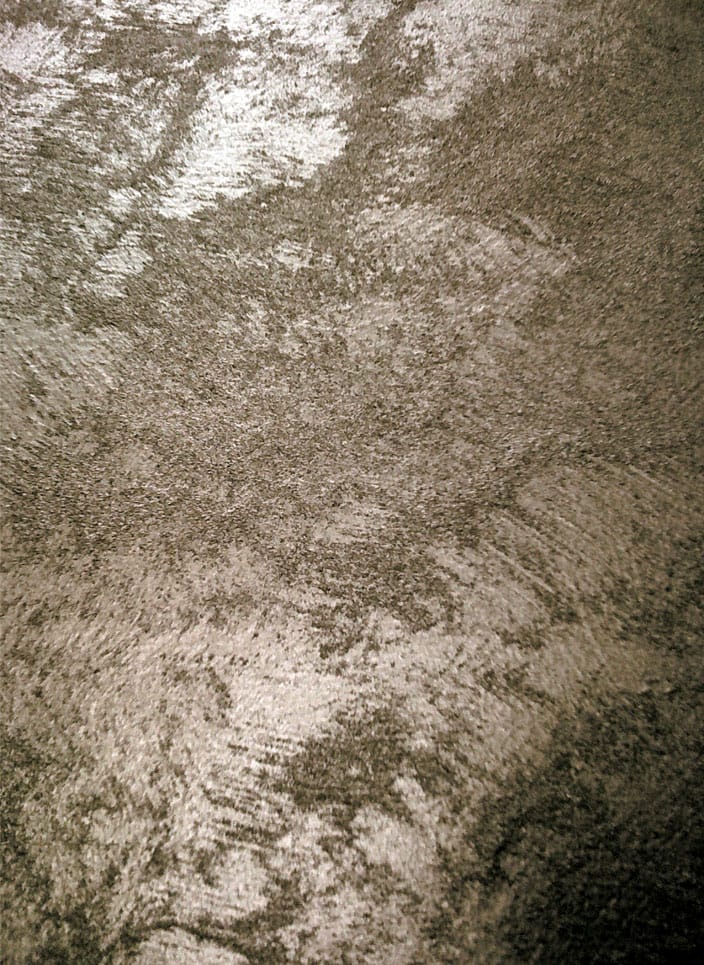 A warm silver paint sample showing its lustre and beautiful grainy texture.
