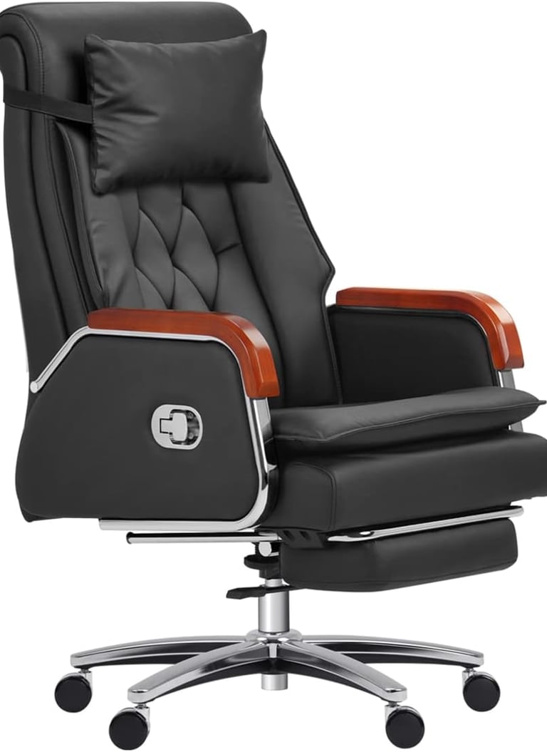 a black and white office chair with a leather reclining chair