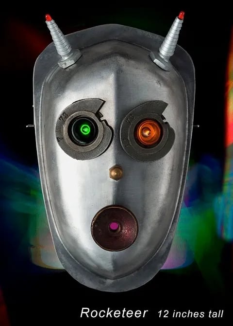 Assemblage robot head named Rocketeer built by sculptor Tal Avitzur.