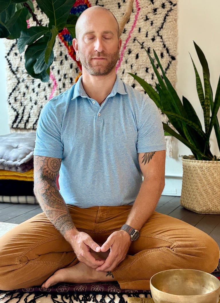 Harrison Blum meditating with legs crossed