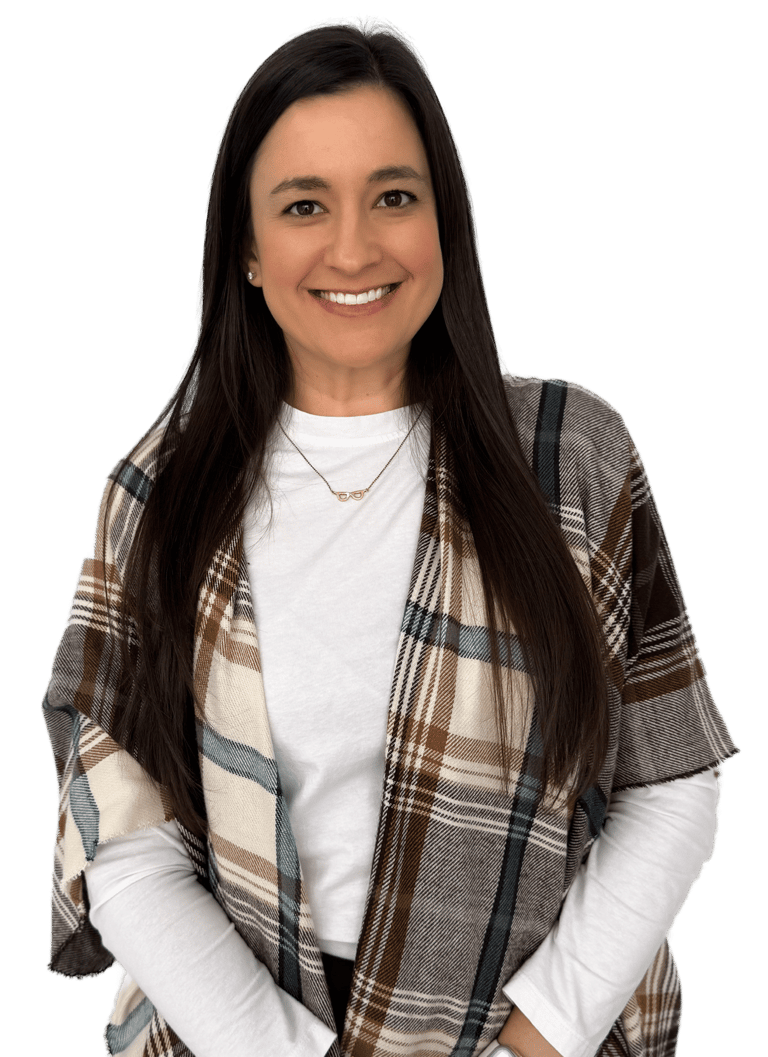 woman with long dark hair wearing a white shirt and plaid scarf