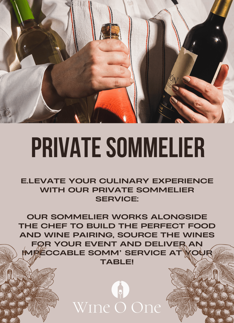 A sommelier holding a bottle of wine