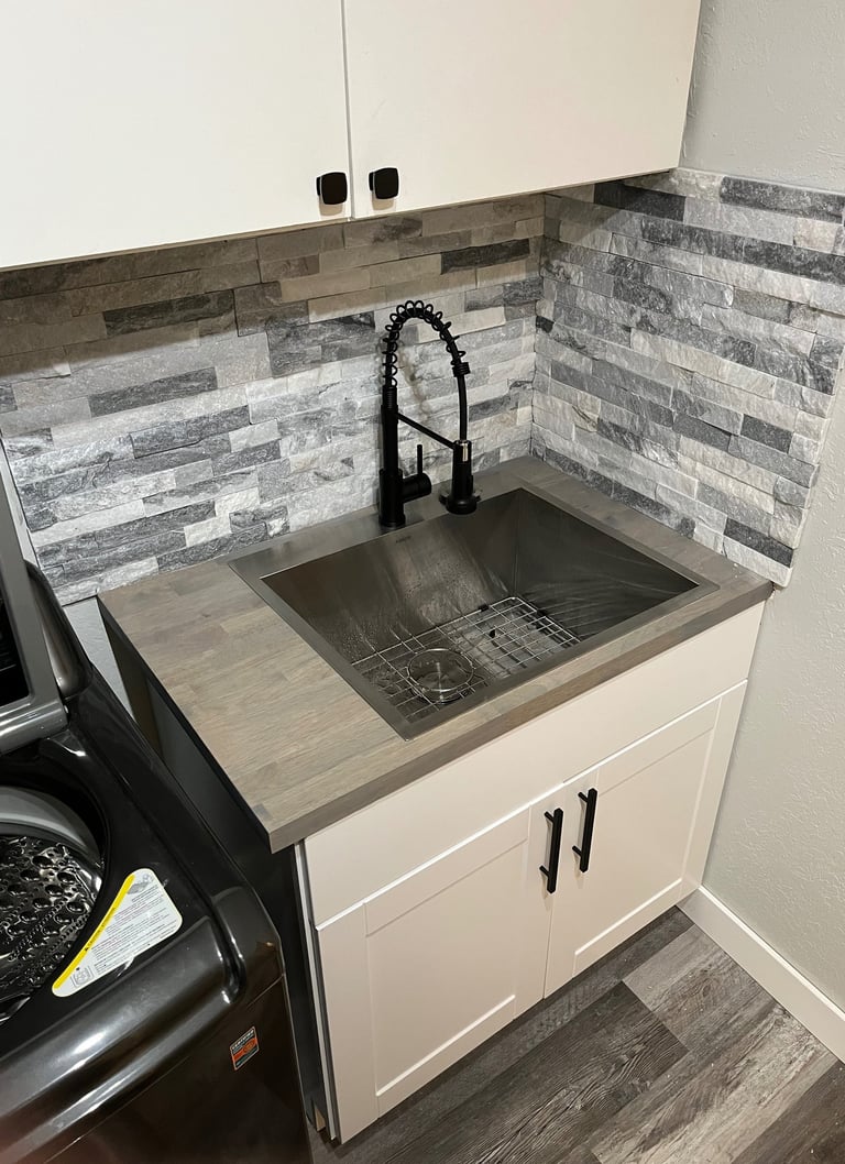 Laundry room sink, cabinet and backsplash replacement