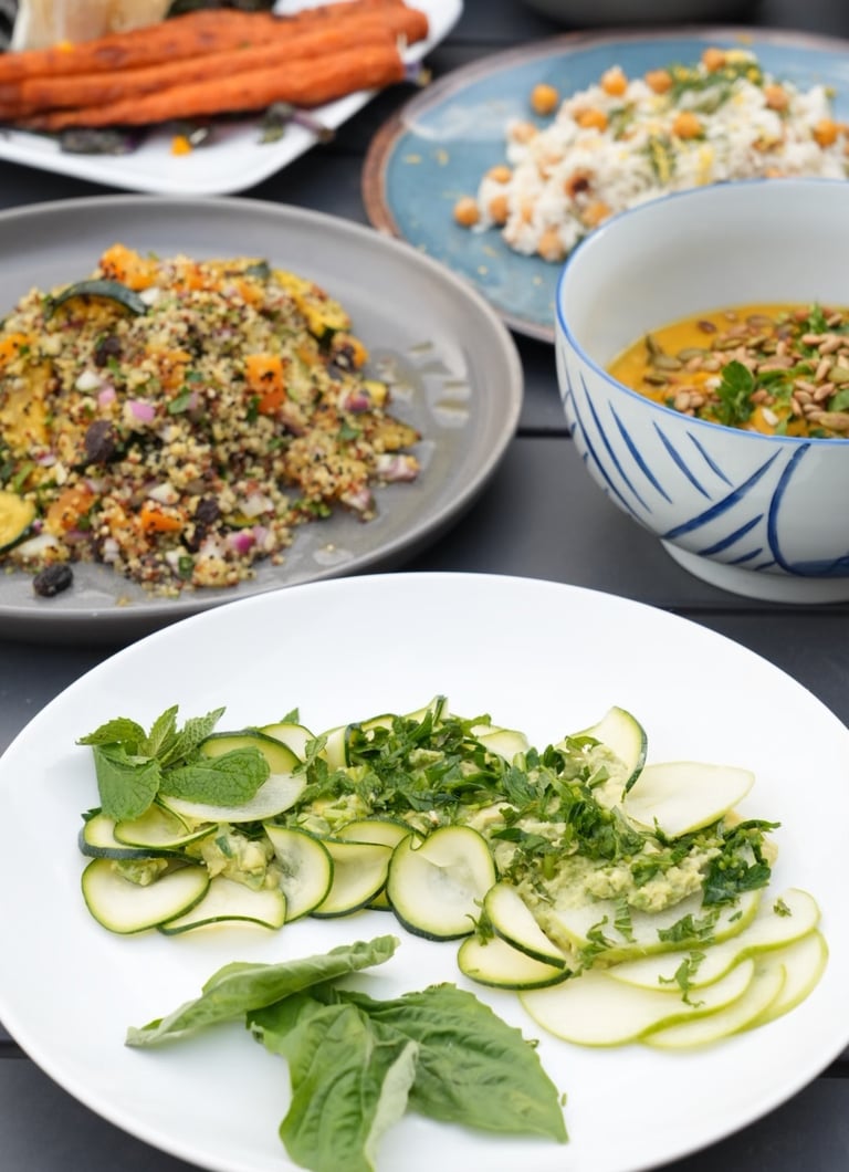 a table with a variety of vegetables