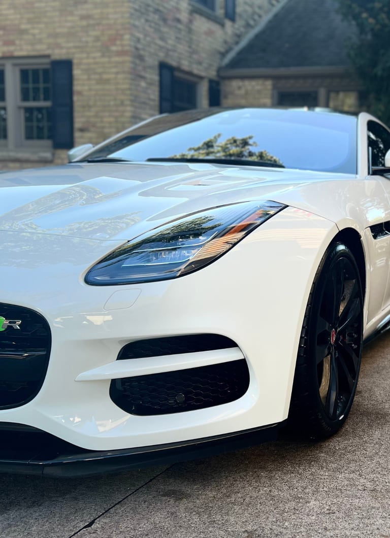 Clean and shiny sports car exterior after a thorough mobile car wash