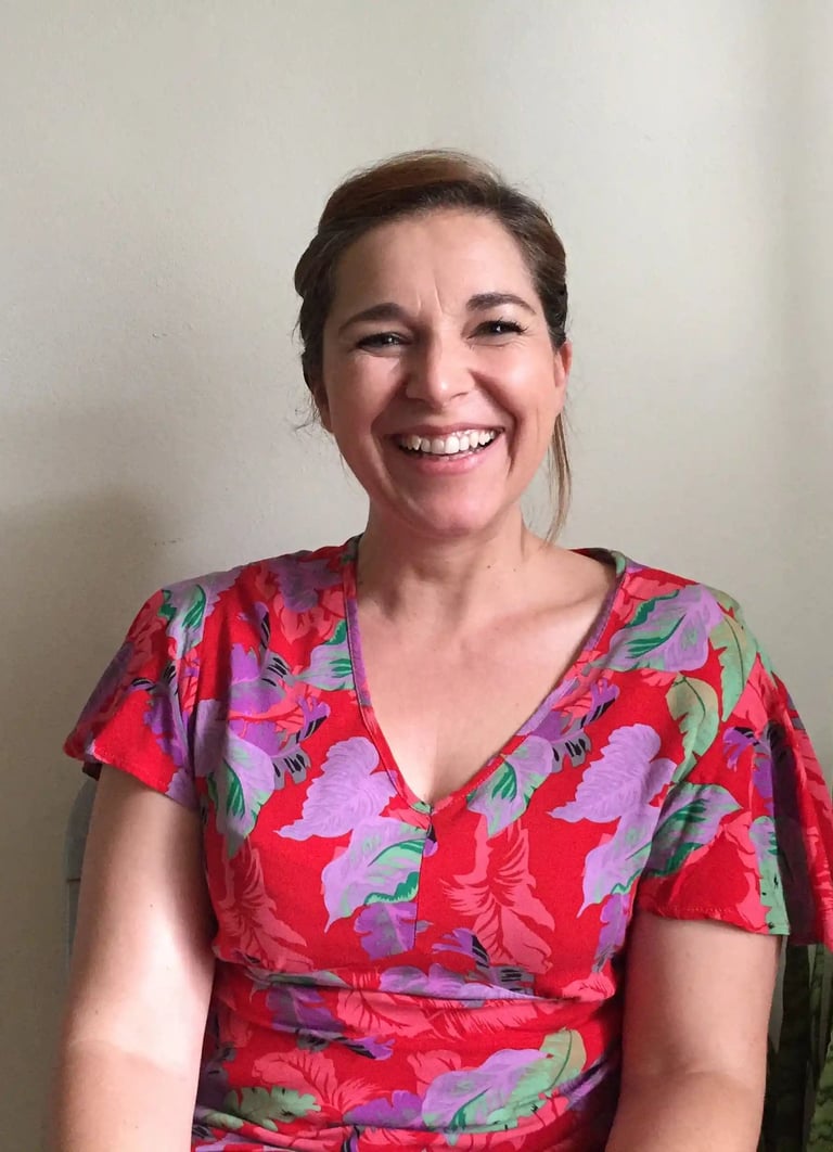 A photograph of the therapist looking at camera smiling warmly