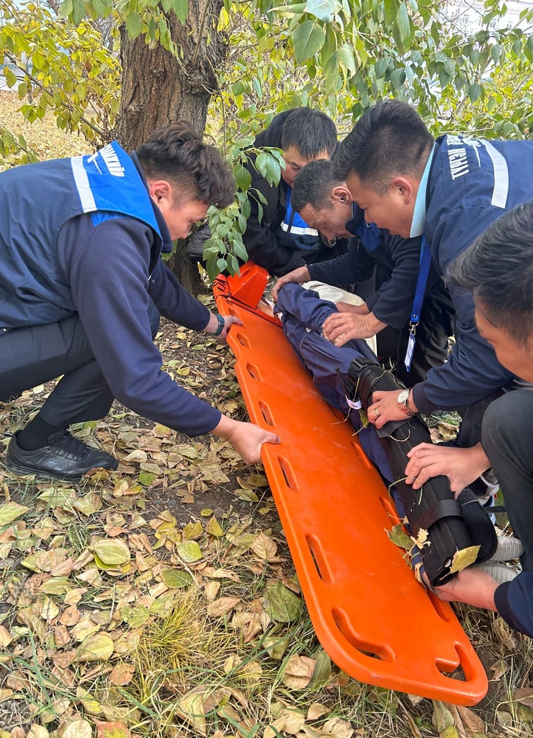 ambulance attendants practicing trauma management