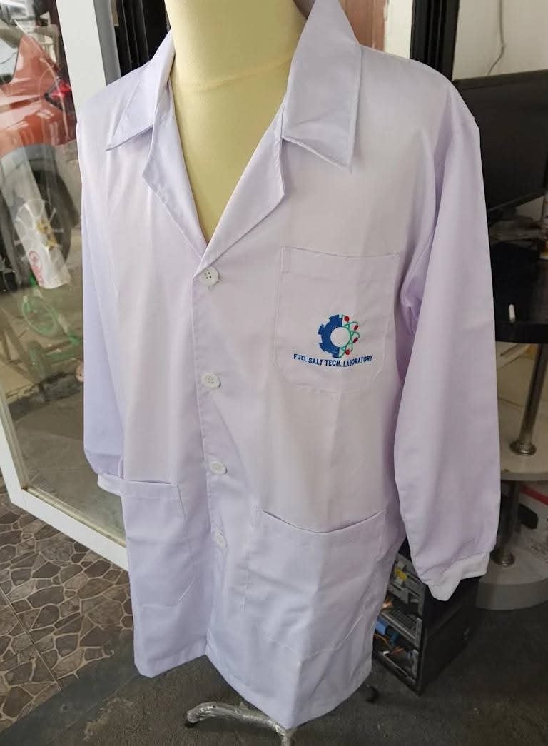 White lab coat with Fuel Salt Tech Laboratory logo displayed on a mannequin for medical or scientific use.