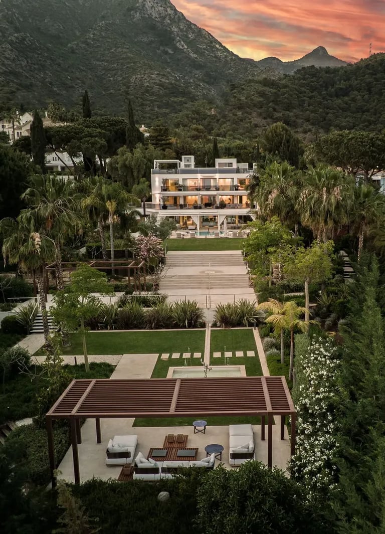 Villa Serenity aerial view with gardens and mountain backdrop