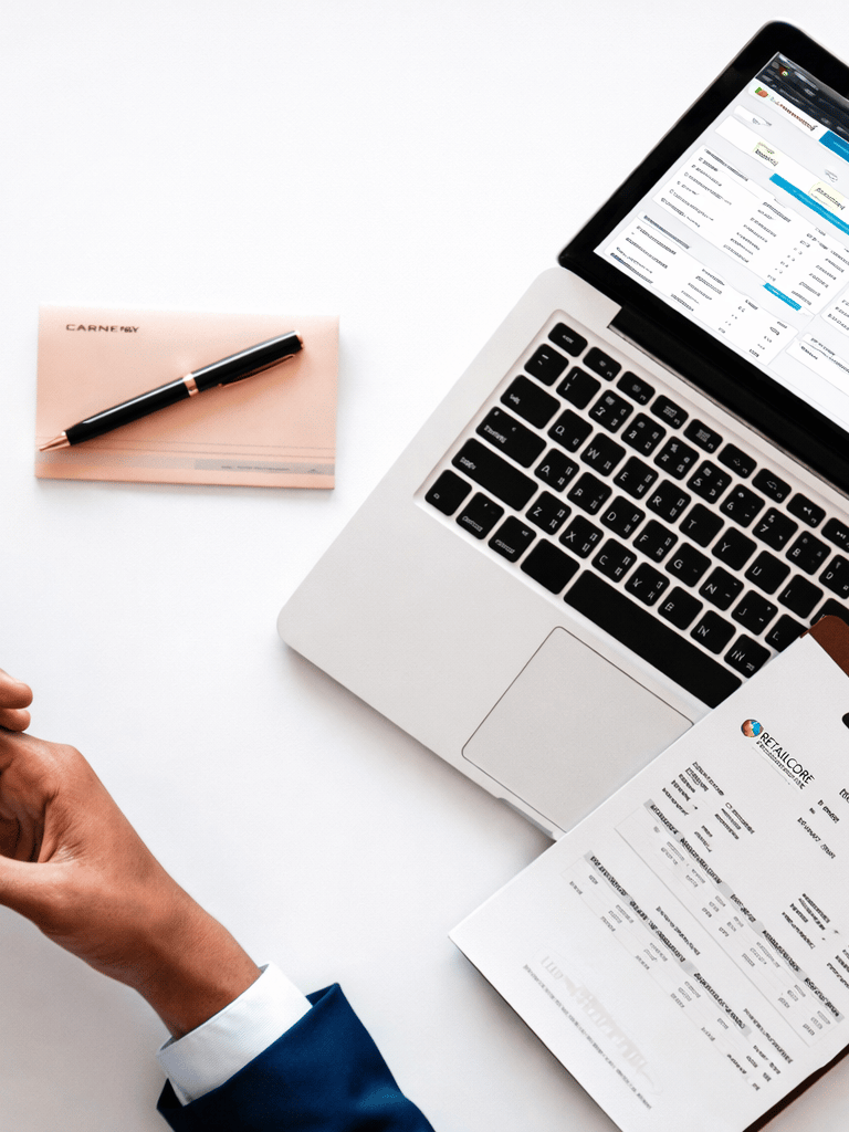 Businessman working with RetailCore Software at his desk