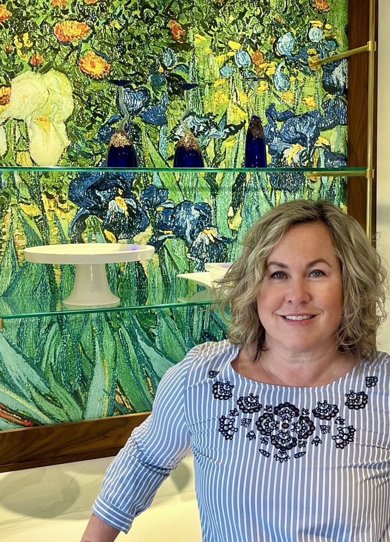 Woman posing in front of stained glass.