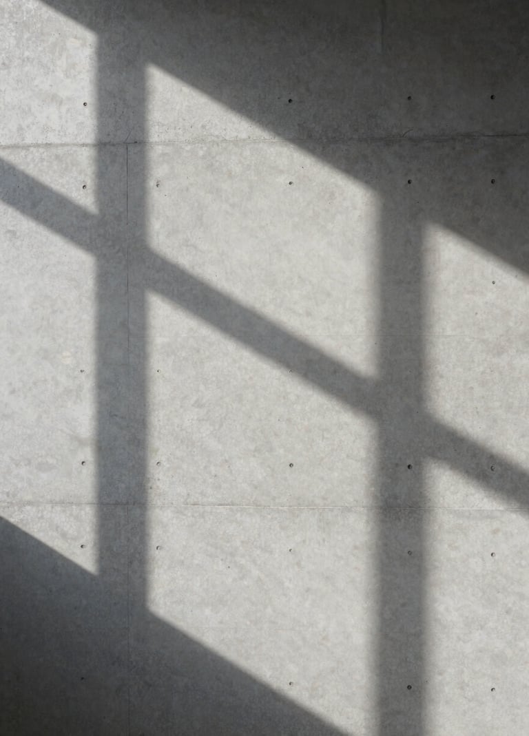 A minimalist, close-up photograph of a concrete wall texture with soft gray shadows cast by an unseen window frame, following a clean and architectural editorial style, Global / Contemporary Art.