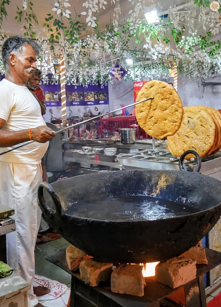 Hot and crispy Nasirabad ka Kachora being freshly fried at Kota Dussehra Mela.