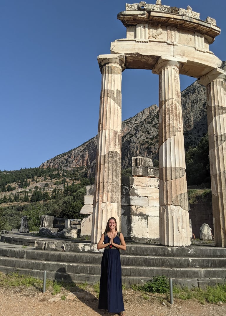 meditation in front of athena temple in delphi greece