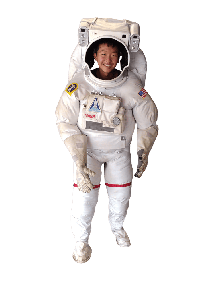 Image of Adam Zheng in an astronaut suit