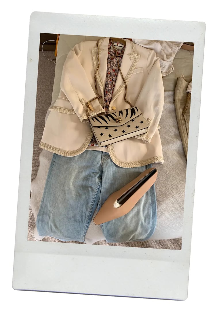 dhm.style wardrobe refresh featuring cream blazer with denim jeans, floral blouse, and designer handbag.