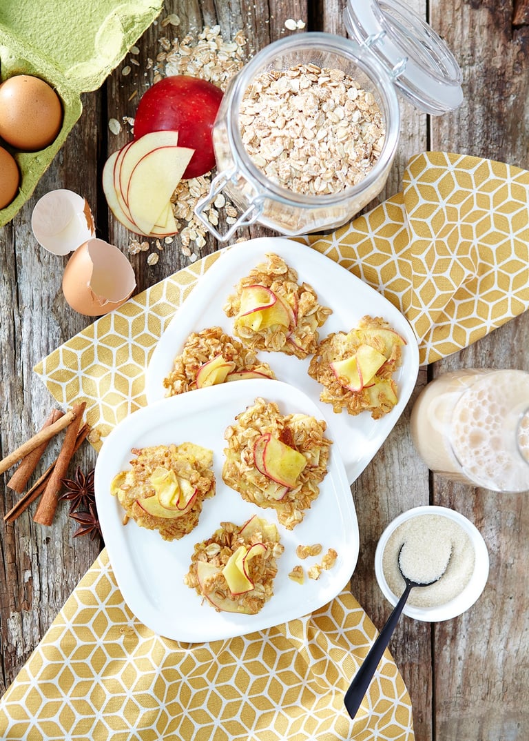 a plate of food with apples and oatmeal on it