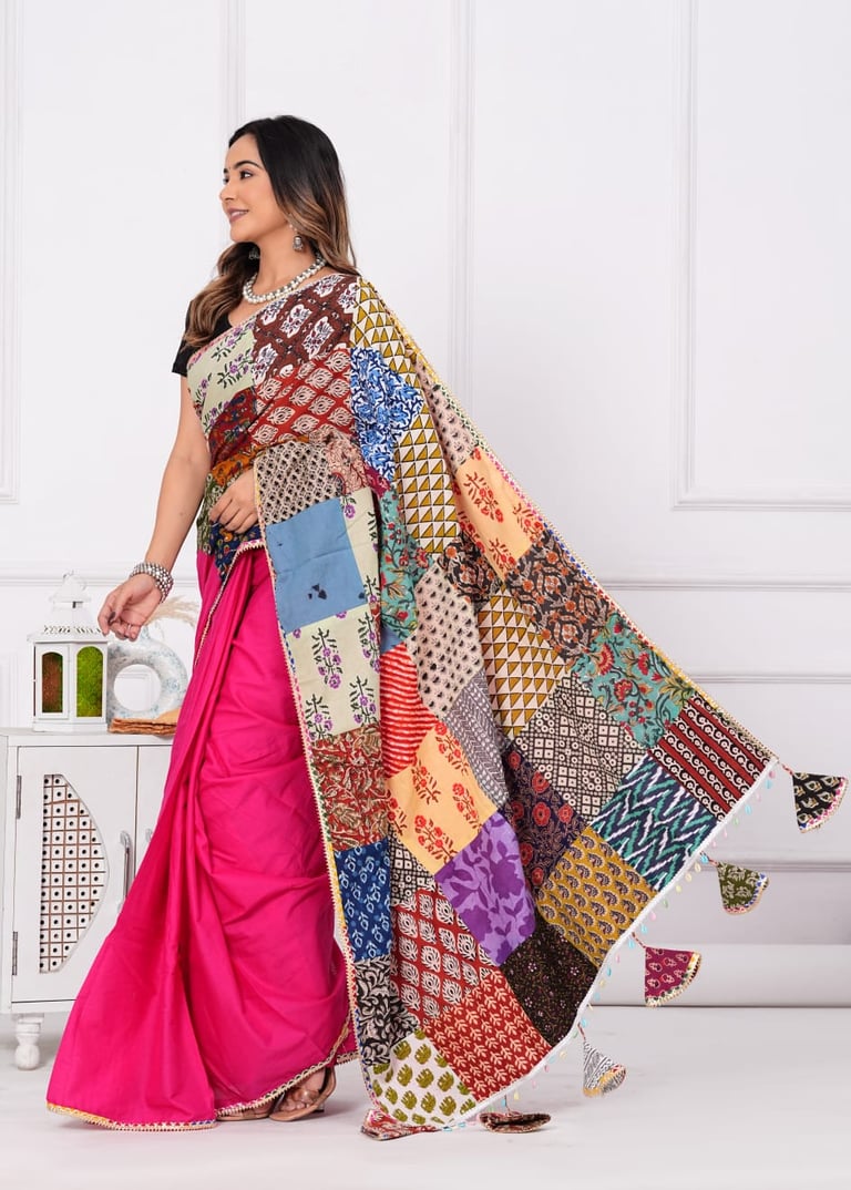 Lightweight mulmul saree featuring premium designer patch work detailing