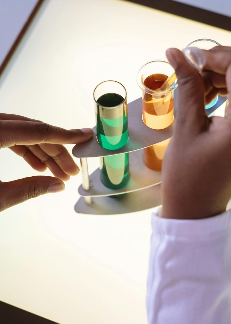 a person holding a tray with a tray of liquid