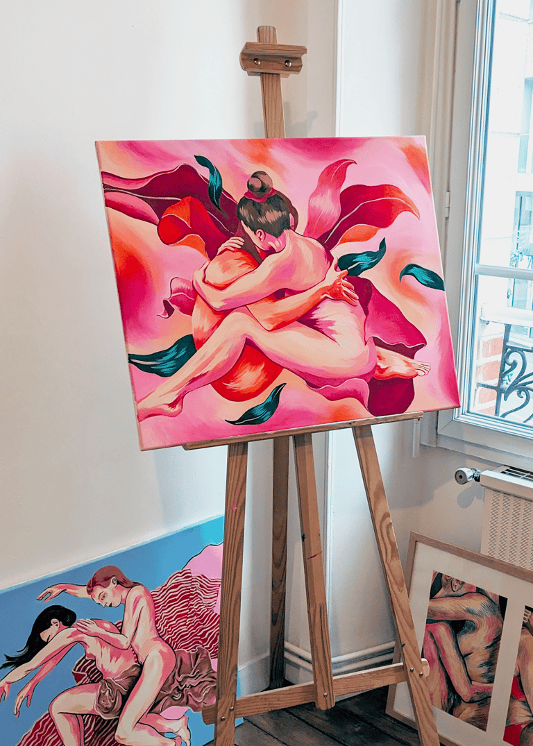 a painting of a woman sitting on a easel