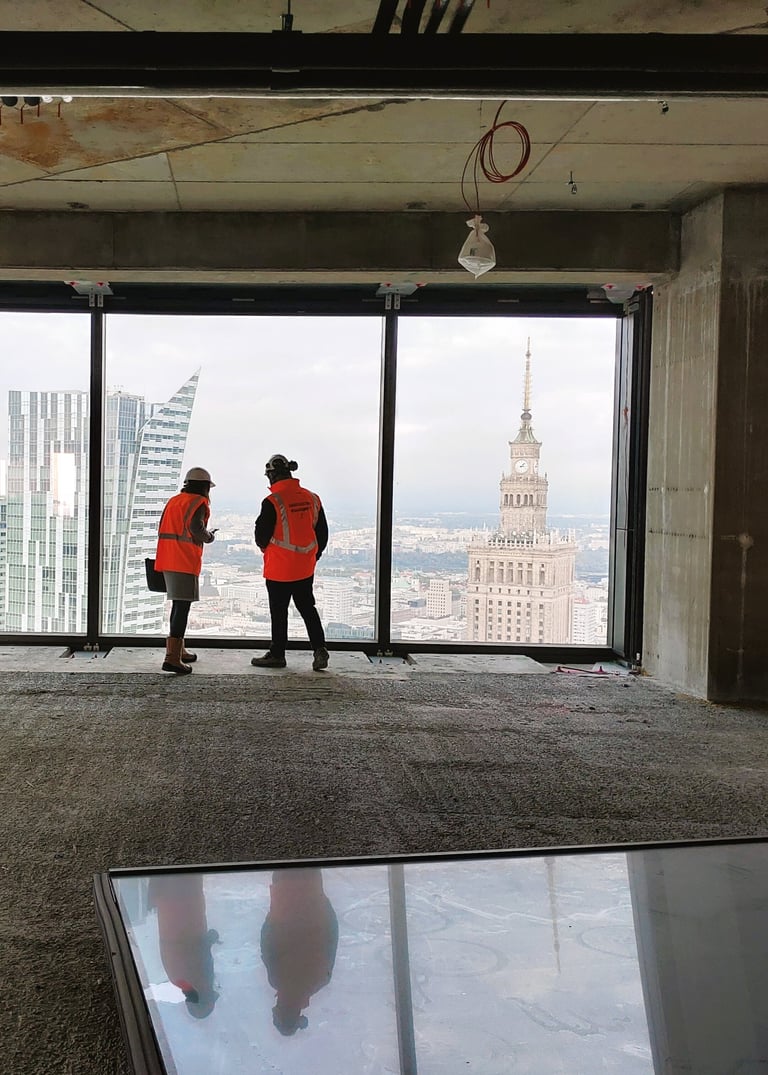 Image of two people on the building site