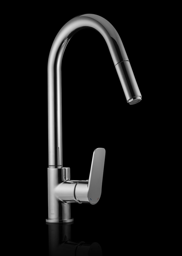 Product photography - a kitchen faucet with a black background