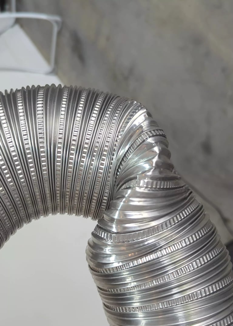 Kink in dryer vent hose.