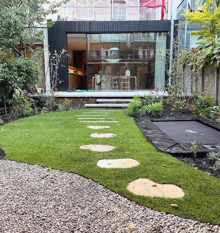 a garden with stepping stones and stepping stones