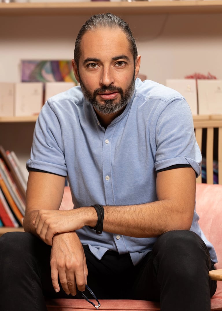 a man sitting on a couch in a room