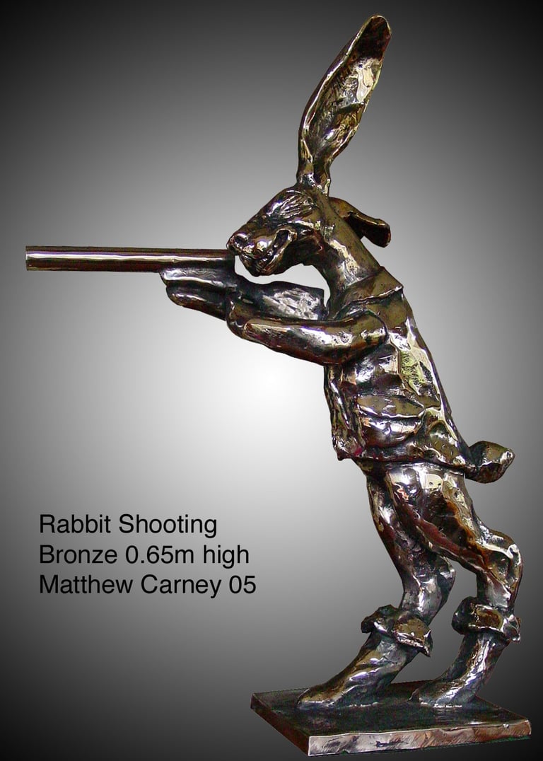 a rabbit shooting a gun 
