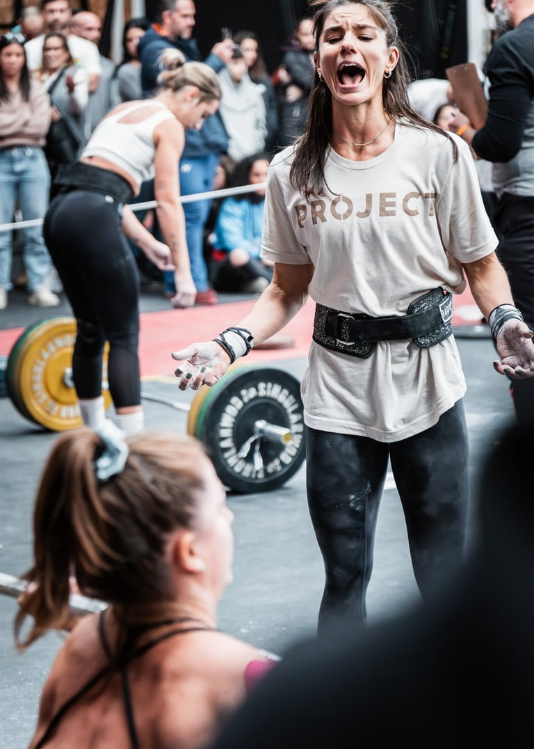 a woman in a white shirt and black pants