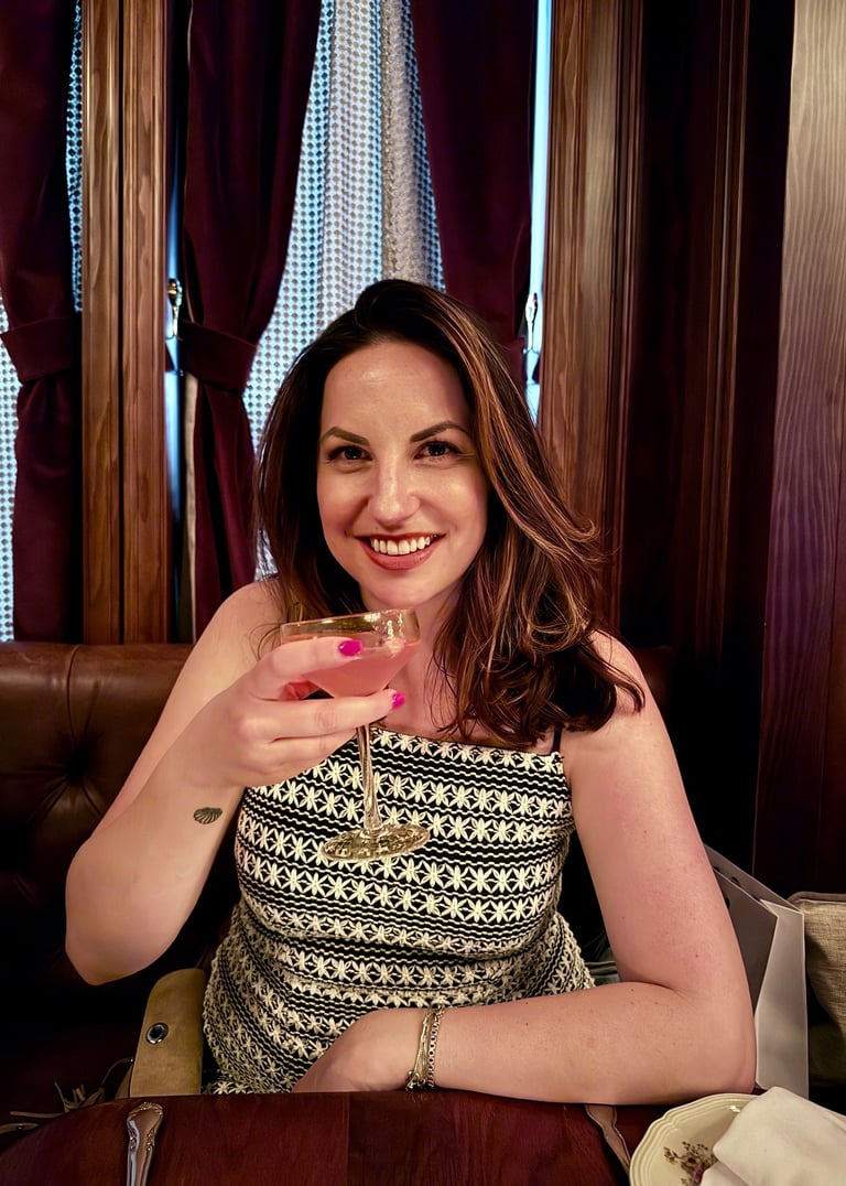 happy woman enjoying her cocktail