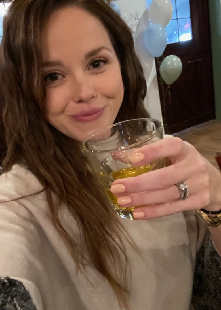 happy woman enjoying her cocktail