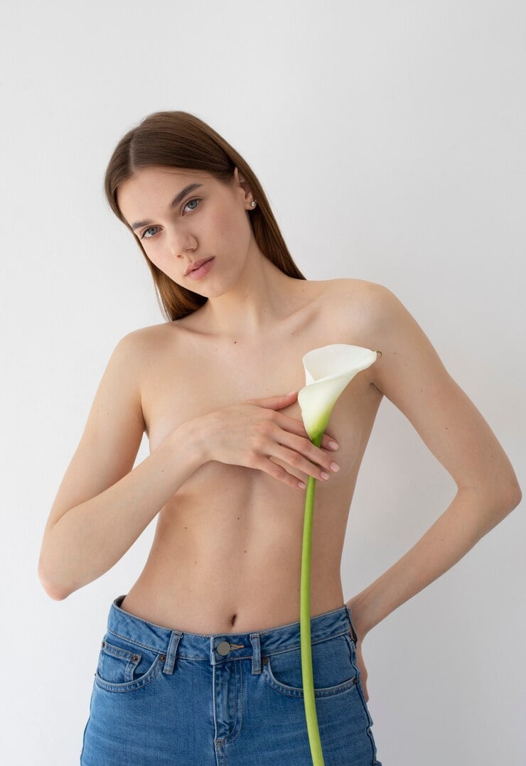 Nude-Girl-Holding-Flower 