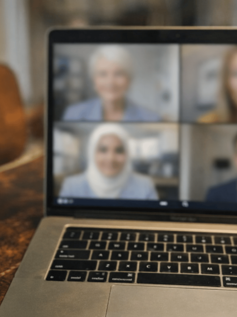 Laptop screen showing Zoom meeting