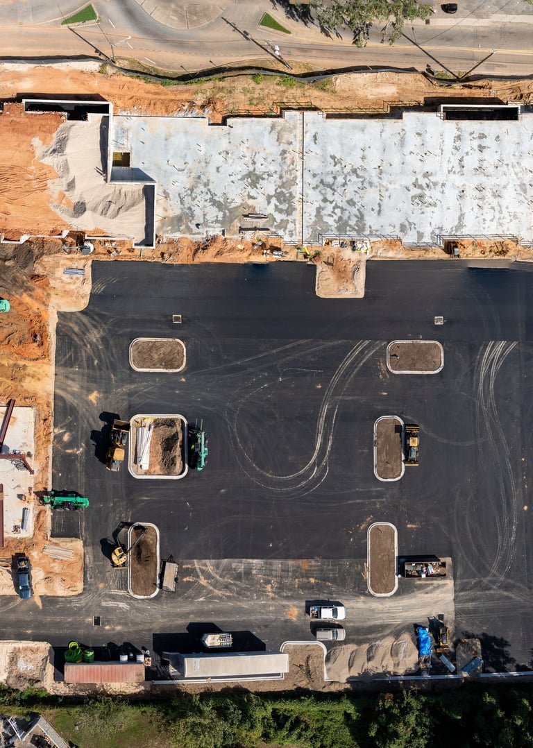 a building under construction with a lot of construction materials