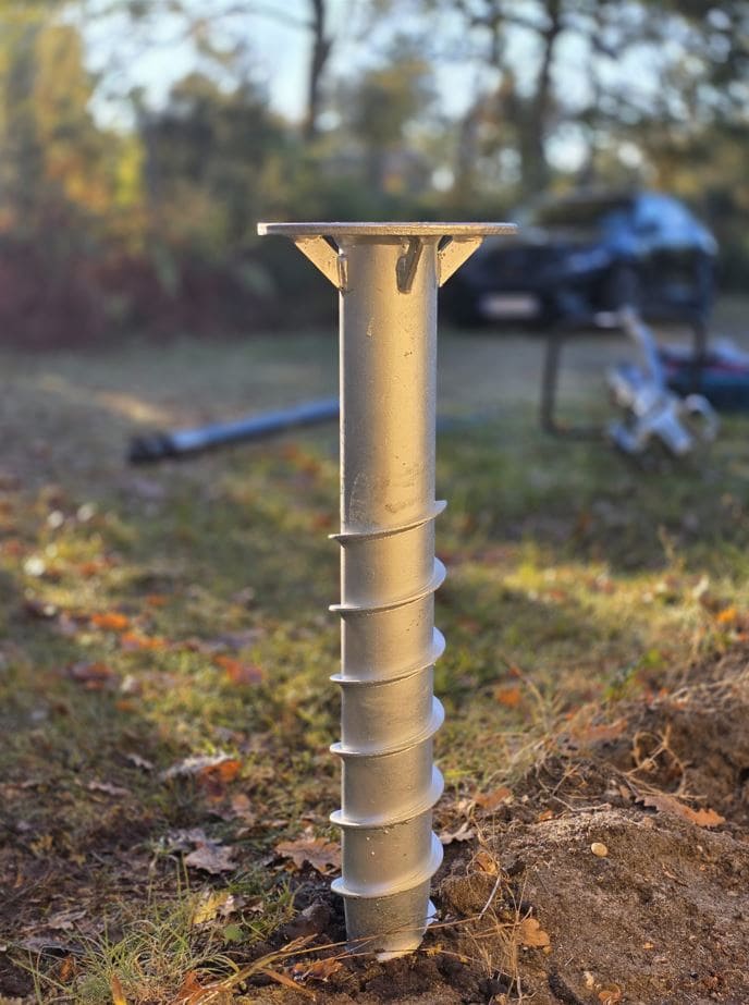 Vis de fondation pour terrasse installée dans le sable