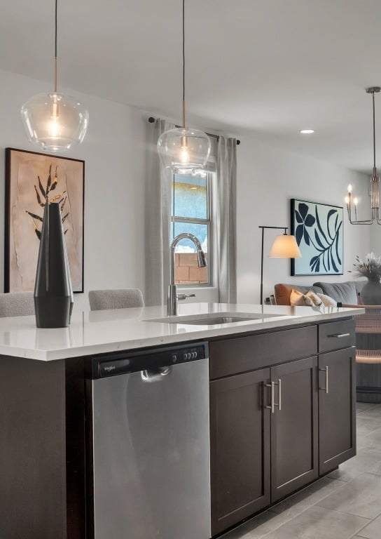 a kitchen with a large window and a table with chairs