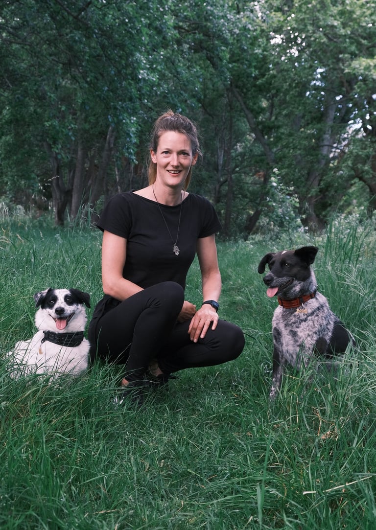 Cape Town dog trainer Isabell with her two dogs
