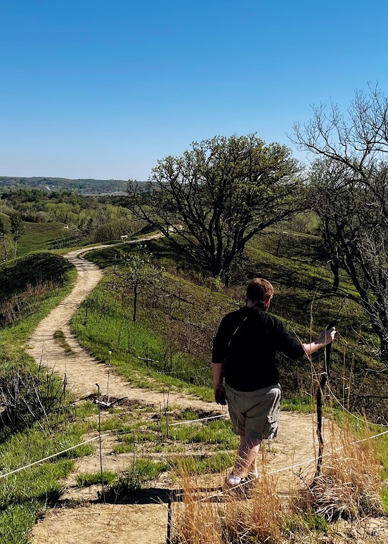 Dusty walking the trail out at Pottawattamie County's scenic Hitchcock Nature Center.
