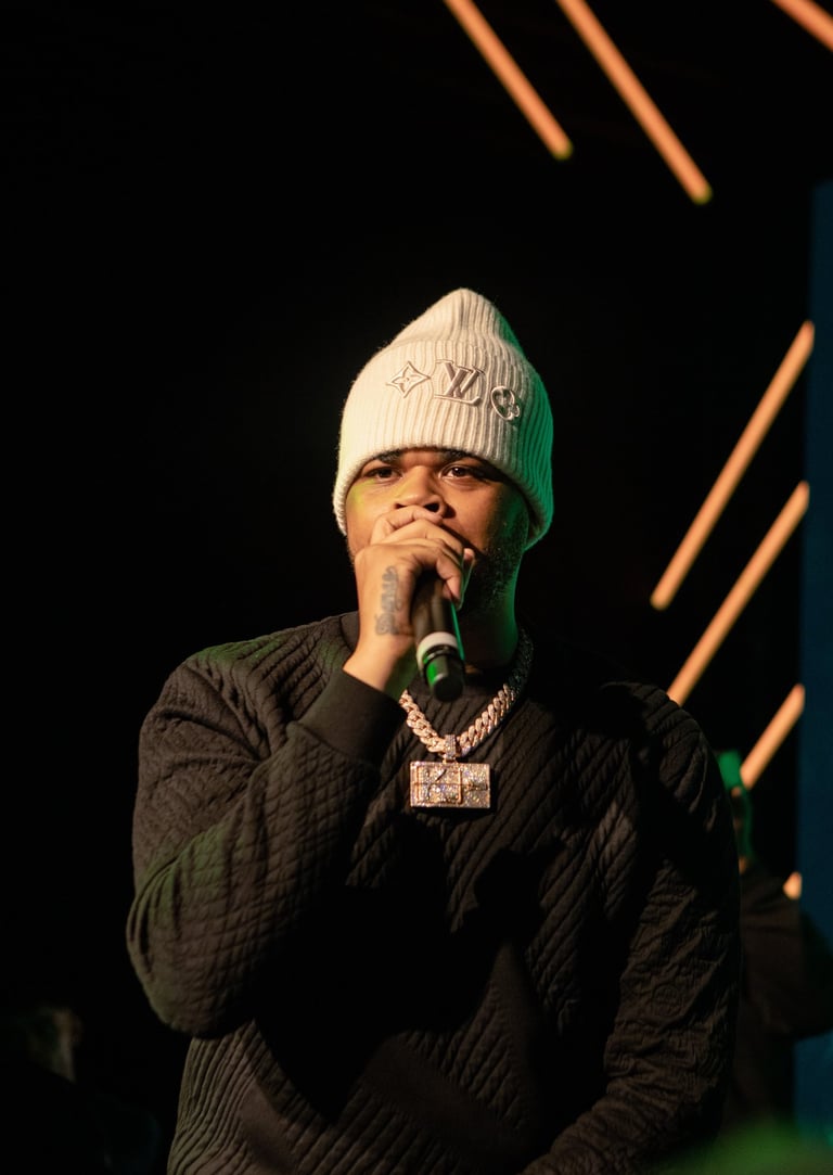 K trap performing at a Nike event