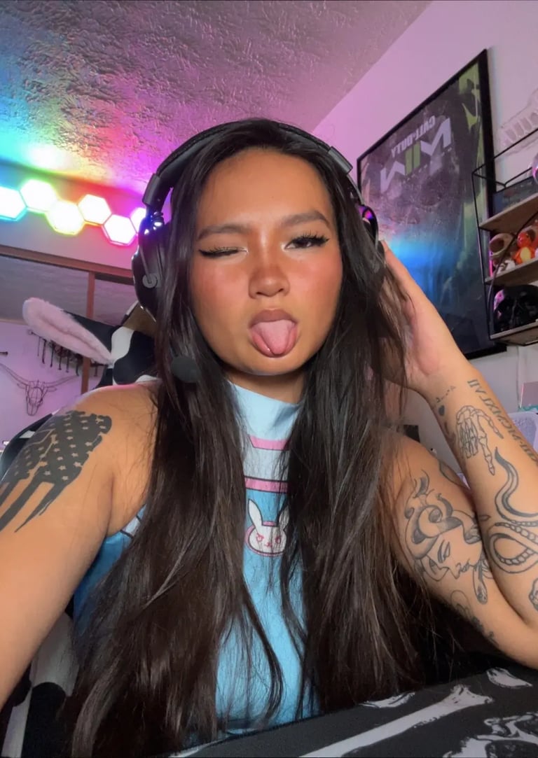 A woman in gaming headphones and a cosplay