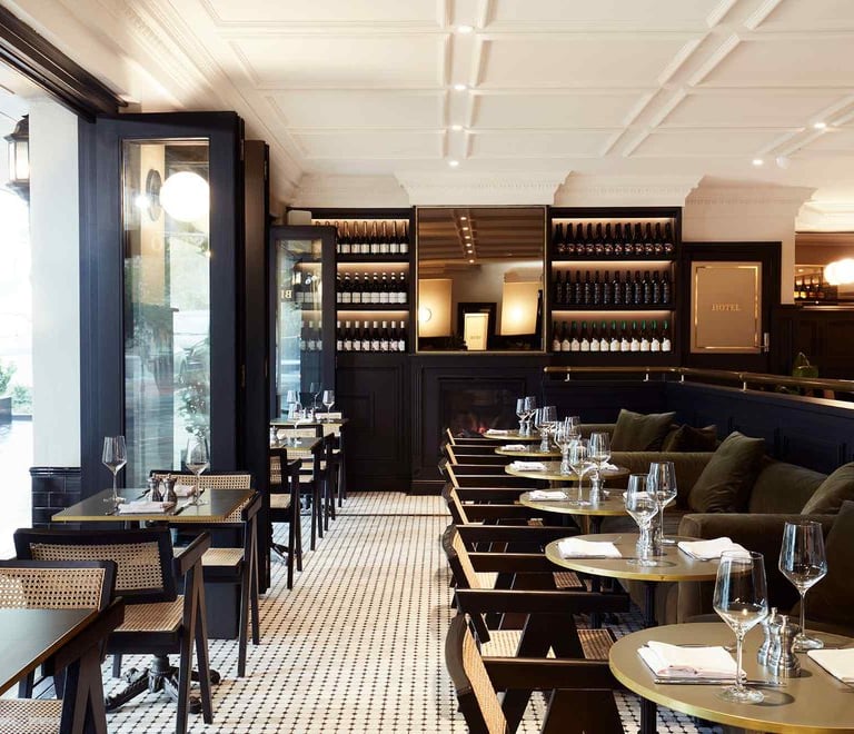 a restaurant with a long table and chairs